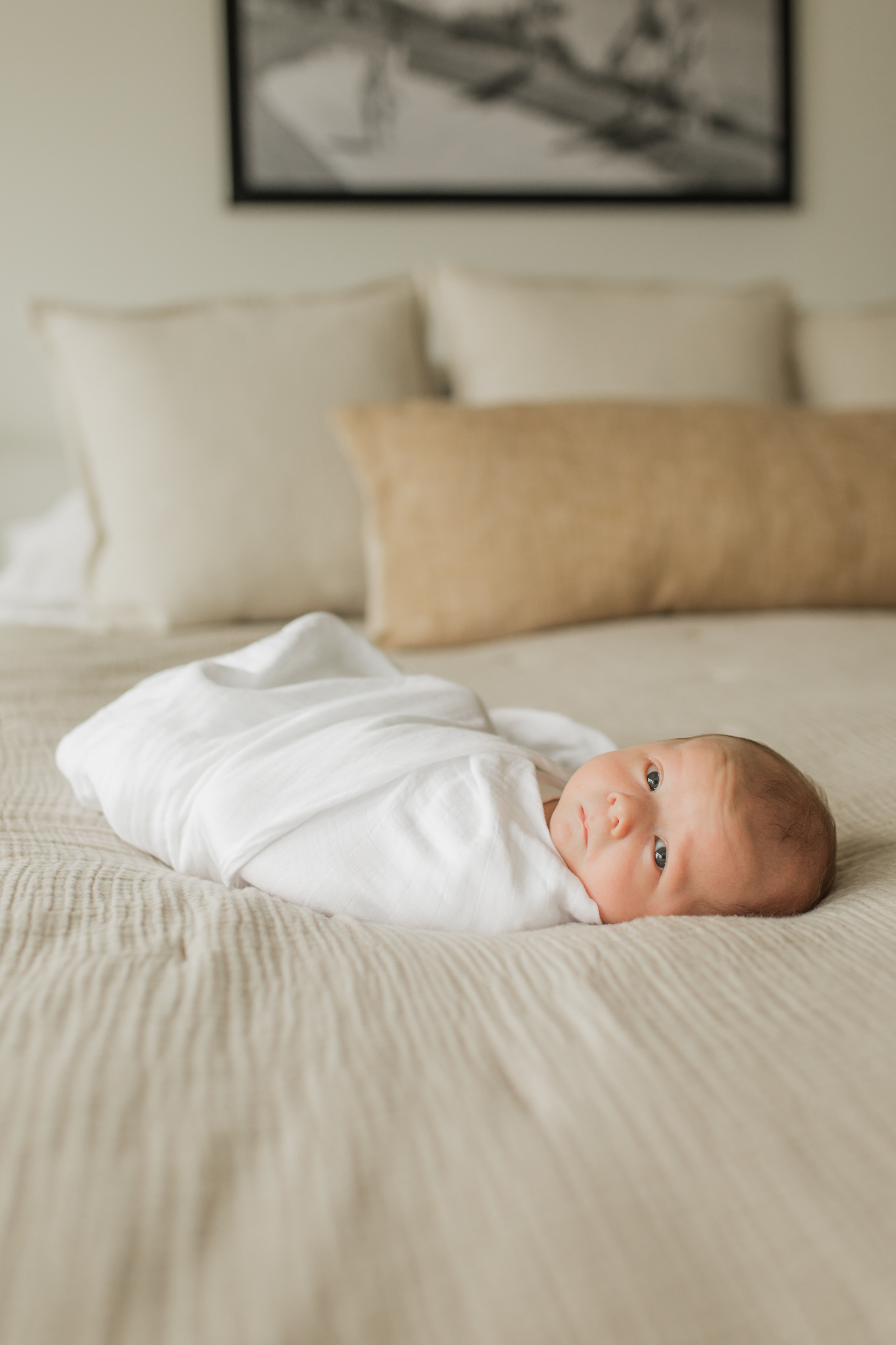 Soft neutral newborn photography image for a blog about baby names from a newborn photographer
