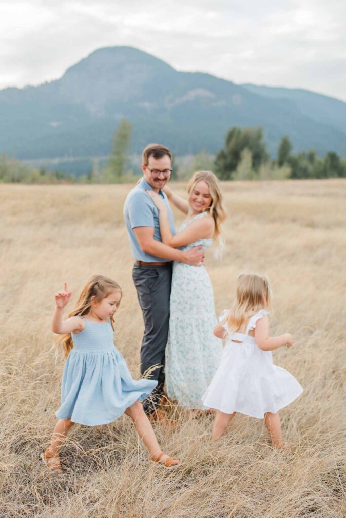Outdoor lifestyle family photo in a field at the Columbia River Gorge in Washougal WA.