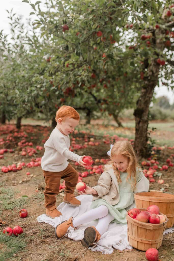 Outdoor lifestyle family photo at an Apple Orchard in Camas, WA.