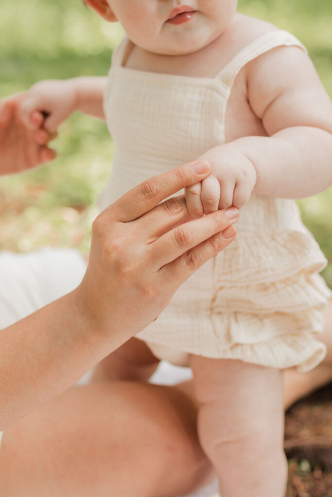 Close-up of mother hugging her child during intimate motherhood session in Vancouver WA.