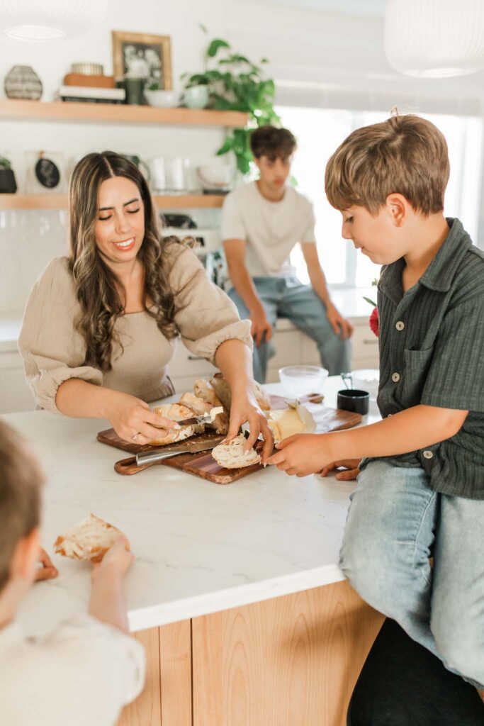 Mama and Me photos with older kids showing connection and joy in home and eating freshly made bread