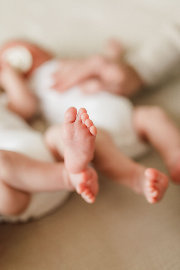Family and newborn photographer in Vancouver WA documenting quiet newborn moments at home