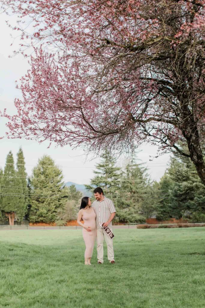 spring maternity photoshoot cherry blossoms Pacific Northwest