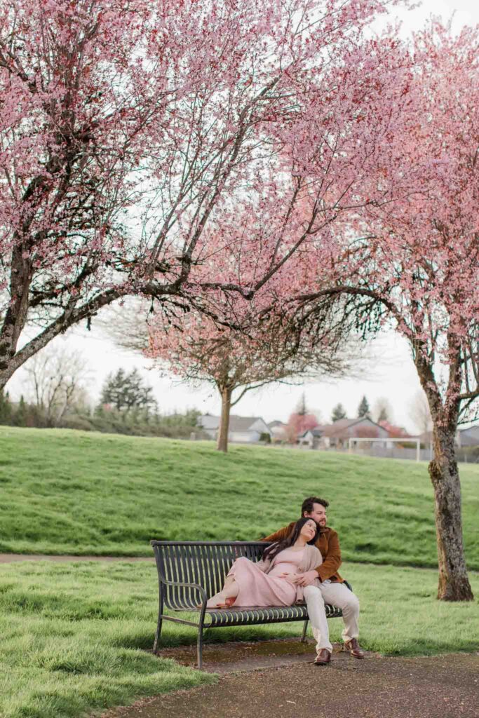 pregnancy photo session under cherry blossoms Washington