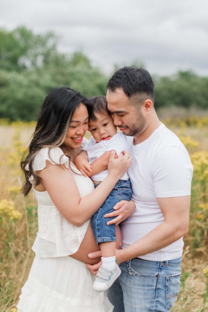 Family of three snuggles during their Camas WA family photo session.